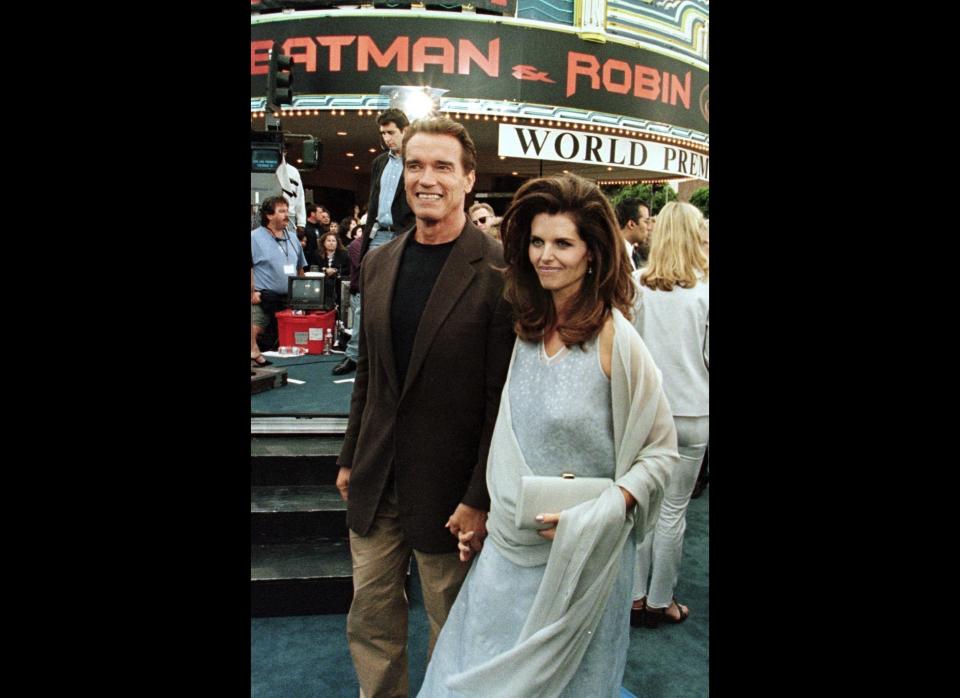 Batman and Robin actor, Arnold Schwarzenegger, arrives with his wife, Maria Shriver, at Mann's Village and Bruin Theater for the world premier of Batman and Robin 12 June in Los Angeles. (HECTOR MATA/AFP/Getty Images/June 12, 1997) 