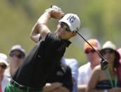 Scott Langley hits his tee shot on the second hole during the final round of the Valspar Championship golf tournament at Innisbrook, Sunday, March 16, 2014, in Palm Harbor, Fla. (AP Photo/Chris O'Meara)