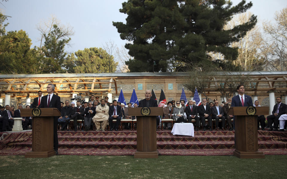 Afghan President Ashraf Ghani, center, U.S. Secretary of Defense Mark Esper, right, and NATO Secretary General Jens Stoltenberg, left, speaks during a joint news conference in presidential palace in Kabul, Afghanistan, Saturday, Feb. 29, 2020. The U.S. is poised to sign a peace agreement with Taliban militants on Saturday aimed at bringing an end to 18 years of bloodshed in Afghanistan and allowing U.S. troops to return home from America's longest war. (AP Photo/Rahmat Gul)