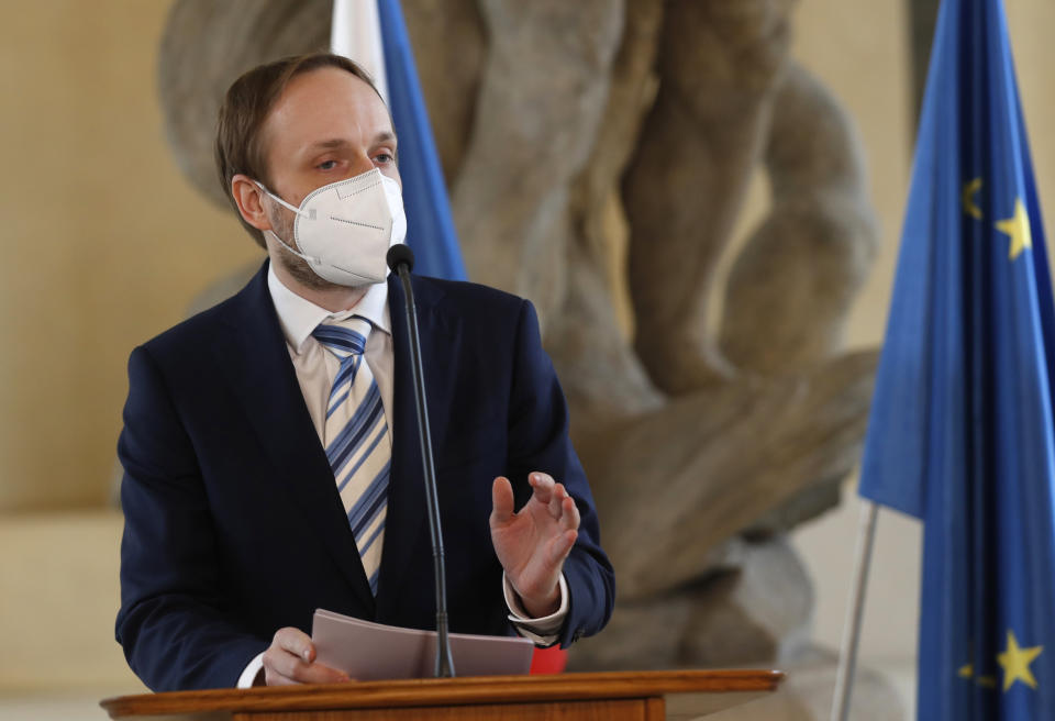 Czech Republic's newly appointed Foreign Minister Jakub Kulhanek addresses media at the Cernin's Palace in Prague, Czech Republic, Wednesday, April 21, 2021. Kulhanek was appointed during a Czech Russia diplomatic crisis over the alleged involvement in a fatal ammunition depot explosion in 2014. (AP Photo/Petr David Josek)