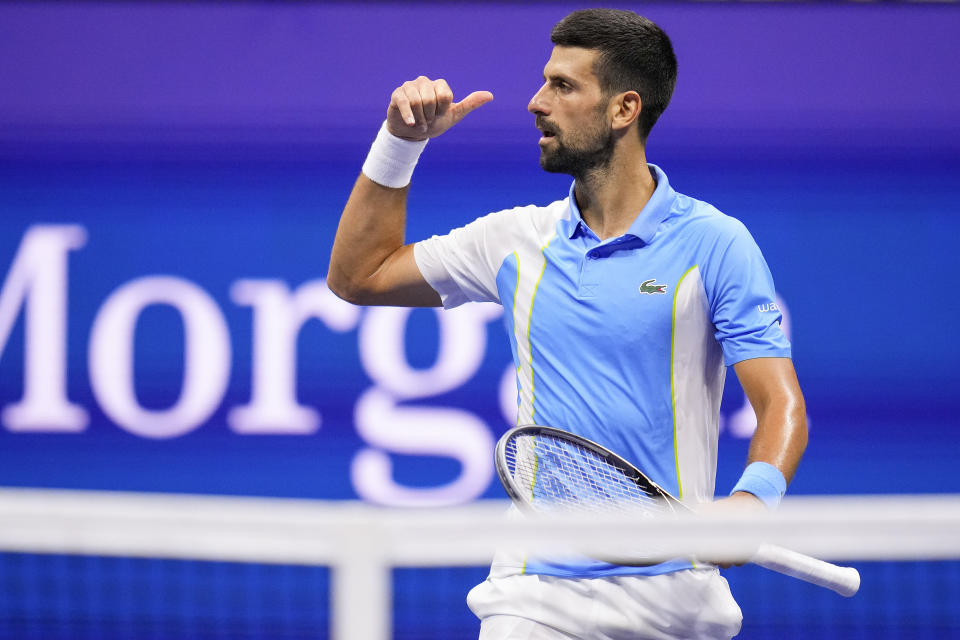 Novak Djokovic, of Serbia, reacts to the crowd after defeating Ben Shelton, of the United States, during the men's singles semifinals of the U.S. Open tennis championships, Friday, Sept. 8, 2023, in New York. (AP Photo/Manu Fernandez)