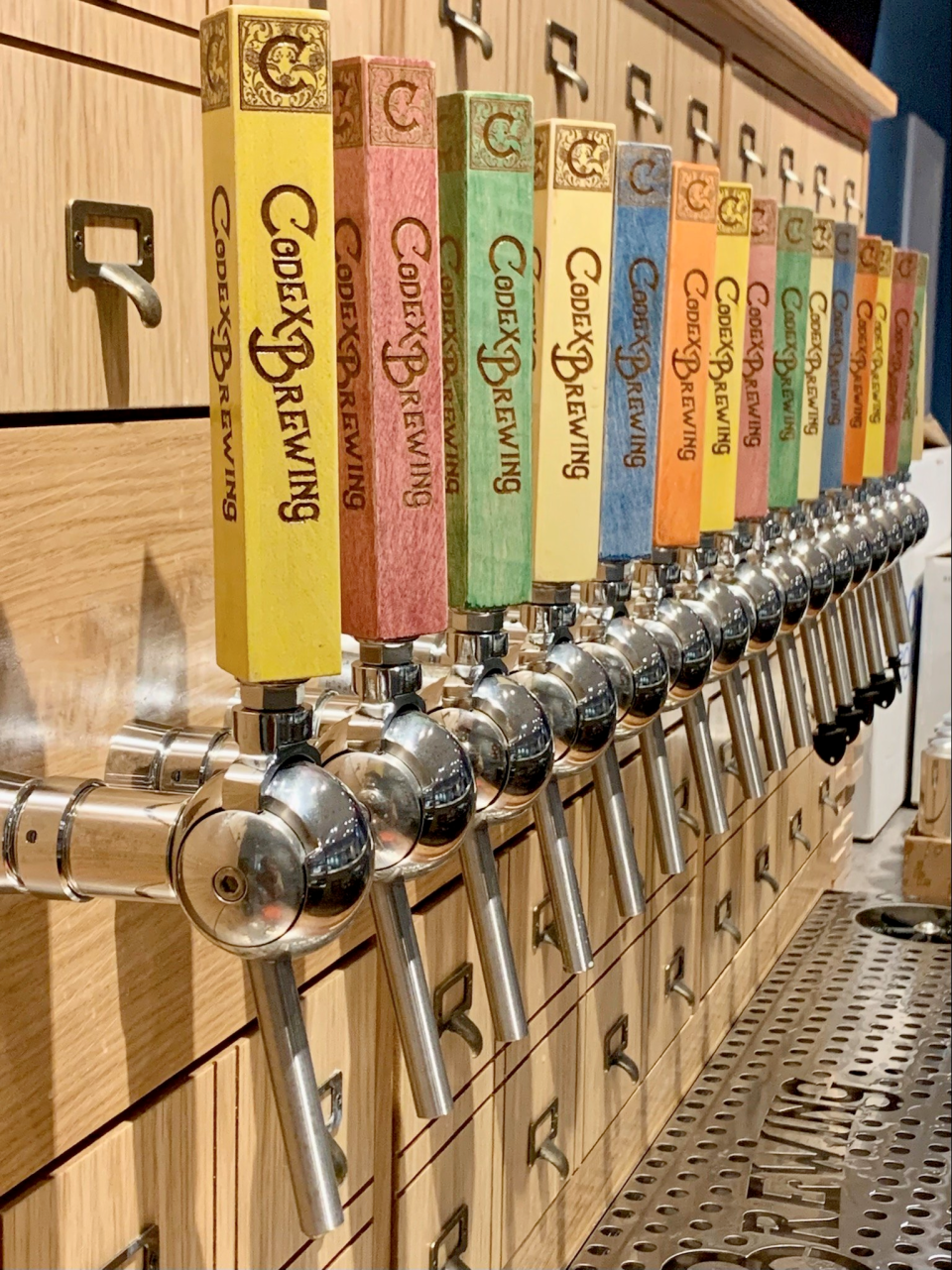 Codex Brewing features a unique selection of craft brews and drive-thru beer pickup available during taproom hours.