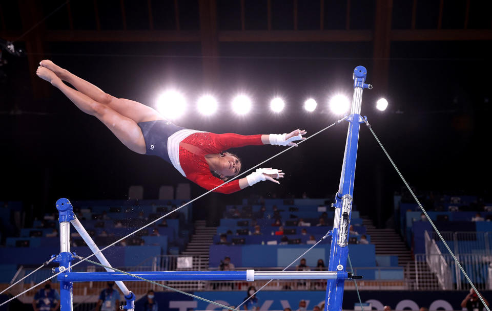 Sunisa Lee of Team United States competes in the uneven bars during the Women's Team Final of the Tokyo 2020 Olympic Games on July 27, 2021.<span class="copyright">Laurence Griffiths—Getty Images</span>