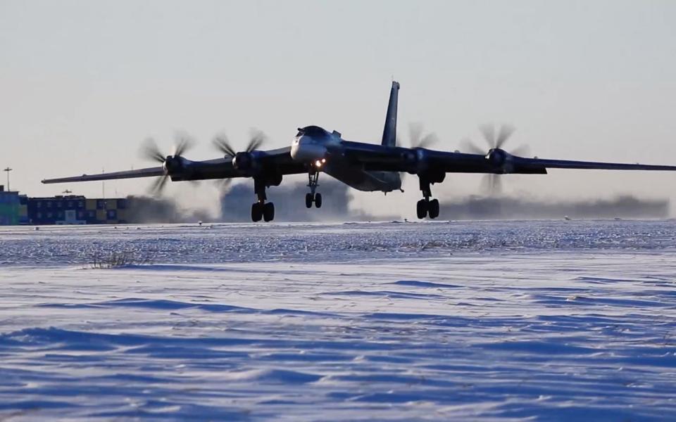 A still image from video, published by the Russian Defence Ministry, shows what it said to be a Tu-95MC strategic bomber - RUSSIAN DEFENCE MINISTRY/via REUTERS