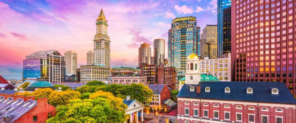 Boston, Massachusetts, USA historic skyline at dusk.