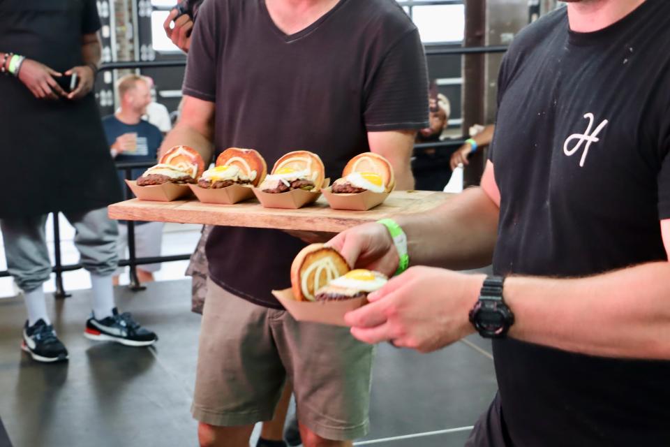 Burger finalists are delivers to judges at the 2023 Detroit Burger Battle.