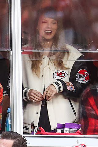 <p>Jamie Squire/Getty</p> Taylor Swift attends the Chiefs-Bengals game on Dec. 31.