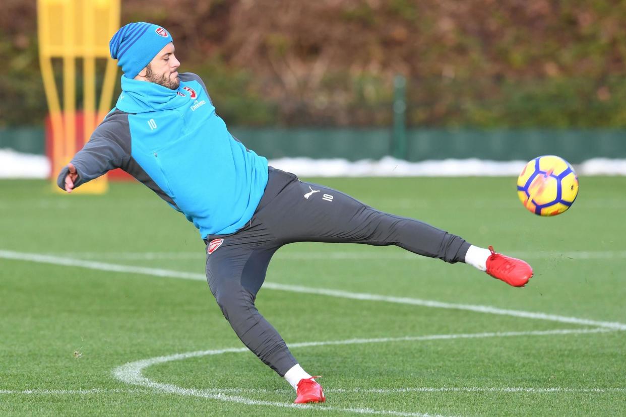 Back in the frame: Wilshere made his first Premier League start for Arsenal in 577 days on Wednesday: Arsenal FC via Getty Images