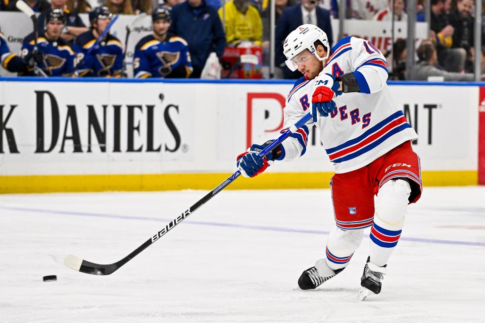Jan 11, 2024; St. Louis, Missouri, USA; New York Rangers left wing Artemi Panarin (10) shoots against the St. Louis Blues during the third period at Enterprise Center.