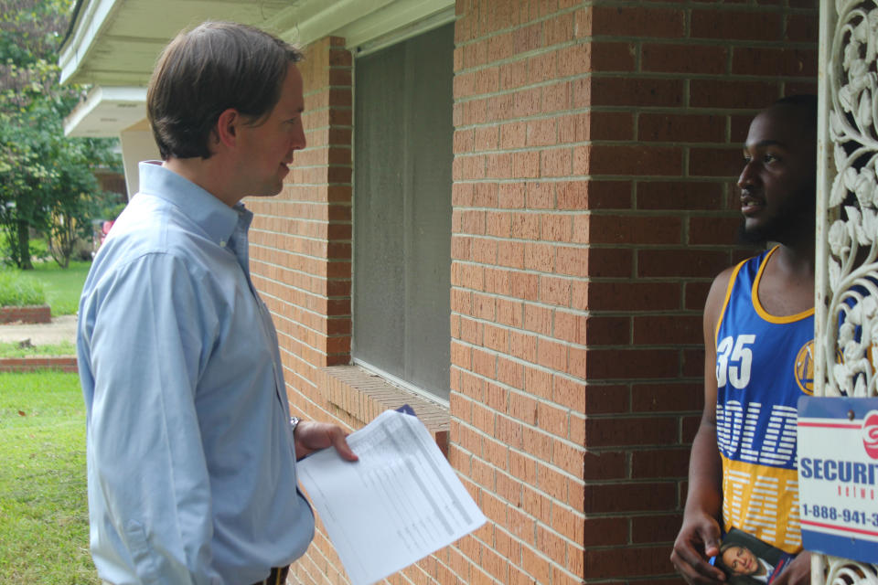 In this Aug. 14, 2018, photo, Democratic state Rep. Clarke Tucker talks to Malik Kelly about his bid for the 2nd Congressional District in Little Rock, Ark. Tucker is challenging Republican U.S. Rep. French Hill in November for the seat, which includes Little Rock and central Arkansas. (AP Photo/Andrew DeMillo)