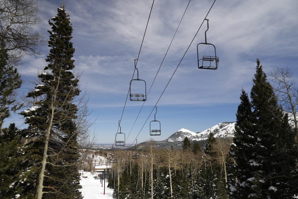 Lift four stands still at Parker-Fitzgerald Cuchara Mountain Park on Sunday, March 19, 2023, near Cuchara, Colo. Although it now functions, the refurbished chairlift didn't pass inspection and requires further work before it can open next season. (AP Photo/Brittany Peterson)