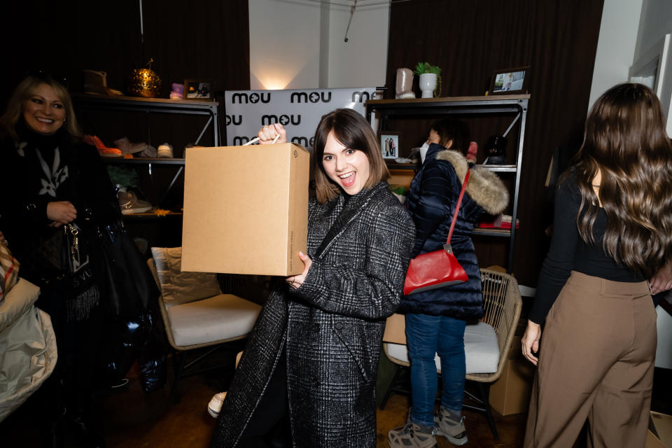 Emilia Jones takes home Mou boots from the Collider Interview Studio at the 2023 Sundance Film Festival. - Credit: Photagonist.ca