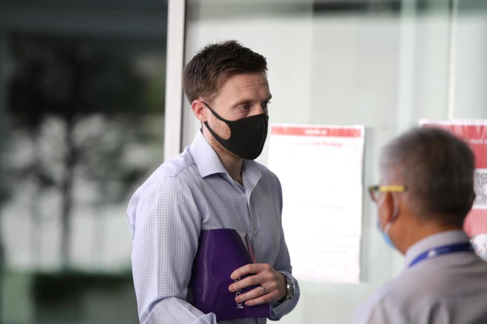 Neil Gordon Buchan walking into the State Courts on 2 June. 