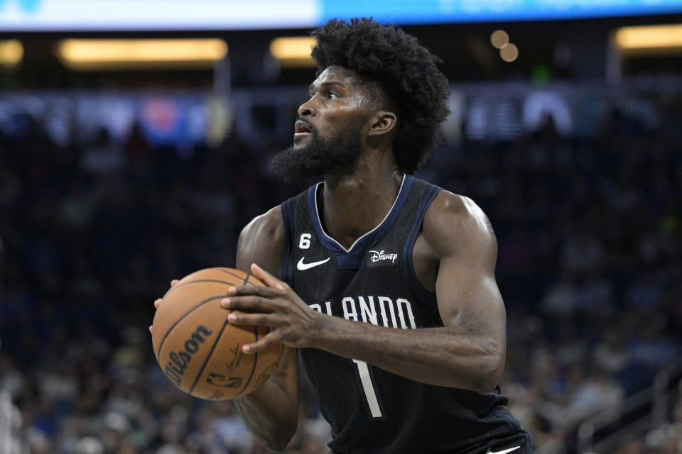 Orlando Magic forward Jonathan Isaac (1) sets up for a 3-pointer during the first half of an NBA basketball game against the Detroit Pistons, Thursday, Feb. 23, 2023, in Orlando, Fla. (AP Photo/Phelan M. Ebenhack)