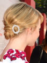 <div class="caption-credit"> Photo by: Getty Images</div><div class="caption-title">Emma Stone</div>"The diamond hair pin really finishes her undo," says Palacios of Stone's low bun. For your own, make a side part and divide a loose ponytail into two sections. Tuck the left section underneath, pinning it into place. Then, move the other section from right to left, tucking and pinning into place. Attach a decorative clip to the side of the updo. <br> <b><br></b><b>More from REDBOOK:</b> <br> <ul> <li> <a rel="nofollow noopener" href="http://www.redbookmag.com/beauty-fashion/tips-advice/winter-accessories?link=rel&dom=yah_life&src=syn&con=blog_redbook&mag=rbk" target="_blank" data-ylk="slk:100 Cute, Affordable Winter Accessories;elm:context_link;itc:0;sec:content-canvas" class="link "><b>100 Cute, Affordable Winter Accessories</b></a> </li> <li> <a rel="nofollow noopener" href="http://www.redbookmag.com/beauty-fashion/tips-advice/celebrity-makeup-looks?link=rel&dom=yah_life&src=syn&con=blog_redbook&mag=rbk" target="_blank" data-ylk="slk:The 50 Most Iconic Beauty Looks of All Time;elm:context_link;itc:0;sec:content-canvas" class="link "><b>The 50 Most Iconic Beauty Looks of All Time</b></a> </li> </ul>