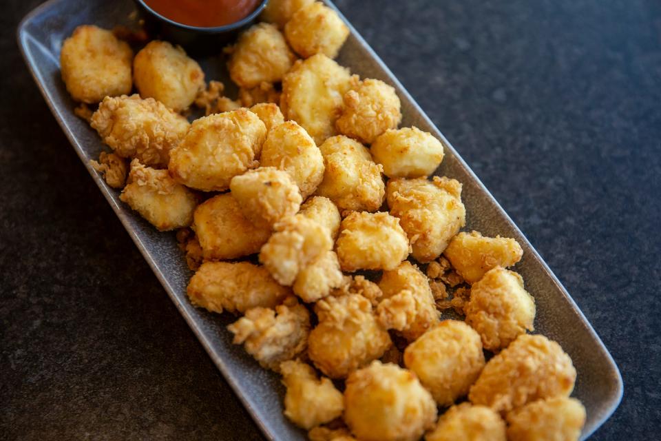 Frisian Farms Gouda cheese curds from the Portermill inside the Des Moines International Airport, on Thursday, Nov. 18, 2021, in Des Moines.