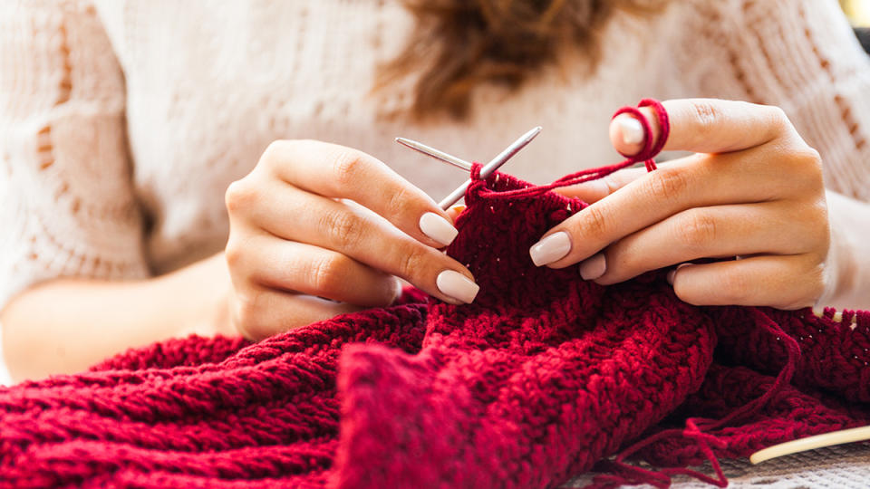 Two hands knitting