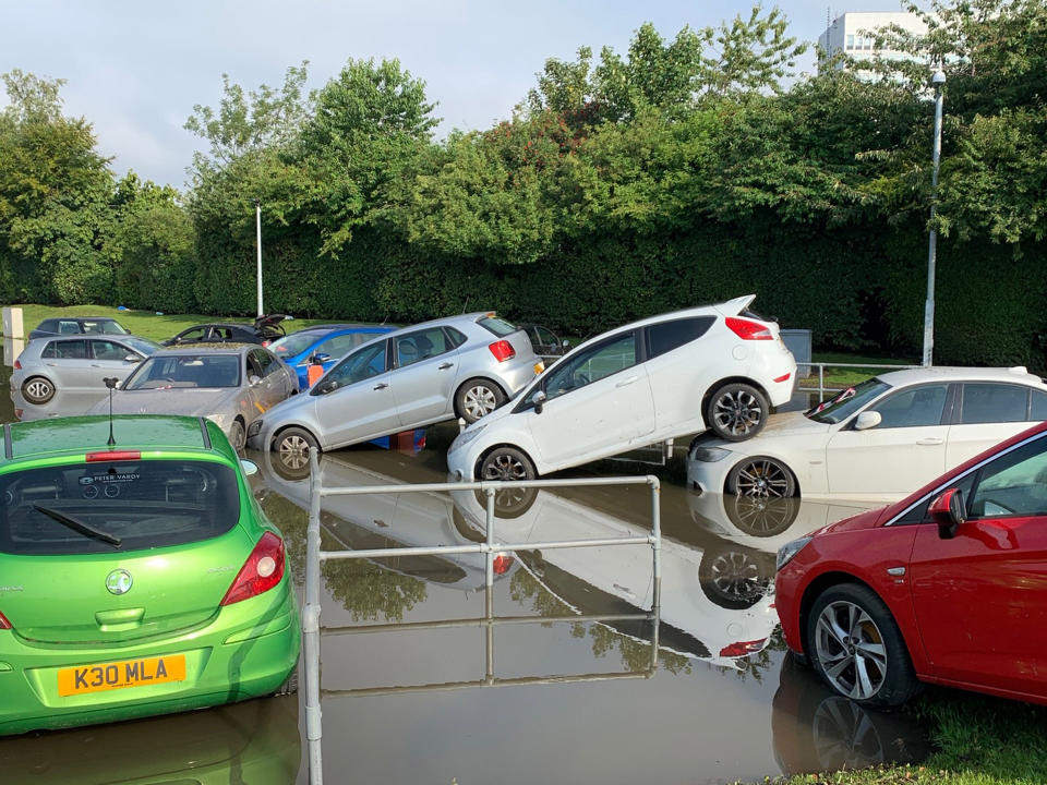 Flooding at Queen Victoria Hospital car park, in Kirkcaldy, Fife, Scotland. Thunderstorm warnings are still current for most of the UK on Wednesday, while high temperatures are forecast again for many parts of England.