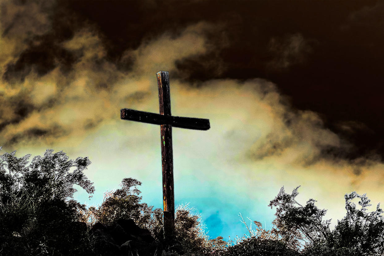 Strange stormy clouds over the cross Getty Images/Vlad Georgescu