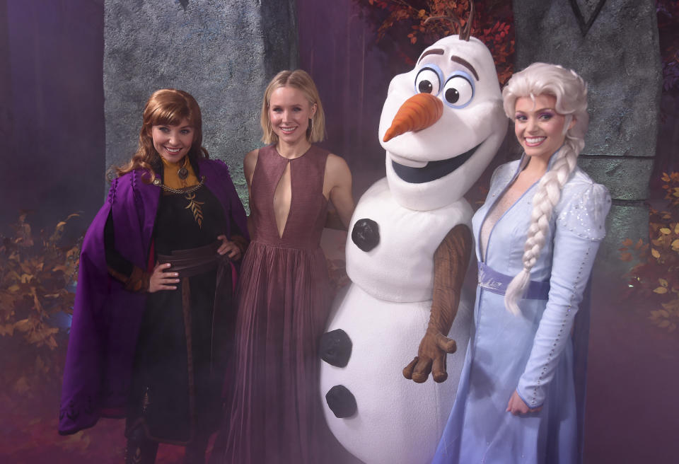 Kristen Bell, second left, poses with characters from the film "Frozen 2" at the world premiere of the film at the Dolby Theatre on Thursday, Nov. 7, 2019, in Los Angeles. (Photo by Chris Pizzello/Invision/AP)