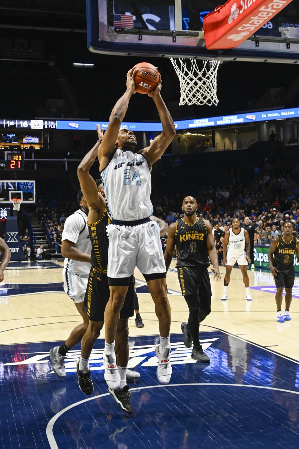 J. D. Weatherspoon scores an easy two points at The Basketball Tournament Friday, July 21, 2023, at the Cintas Center. The event featured Nasty 'Nati, which consisted of UC alumni, and Zip'em Up, made up of Xavier alumni.