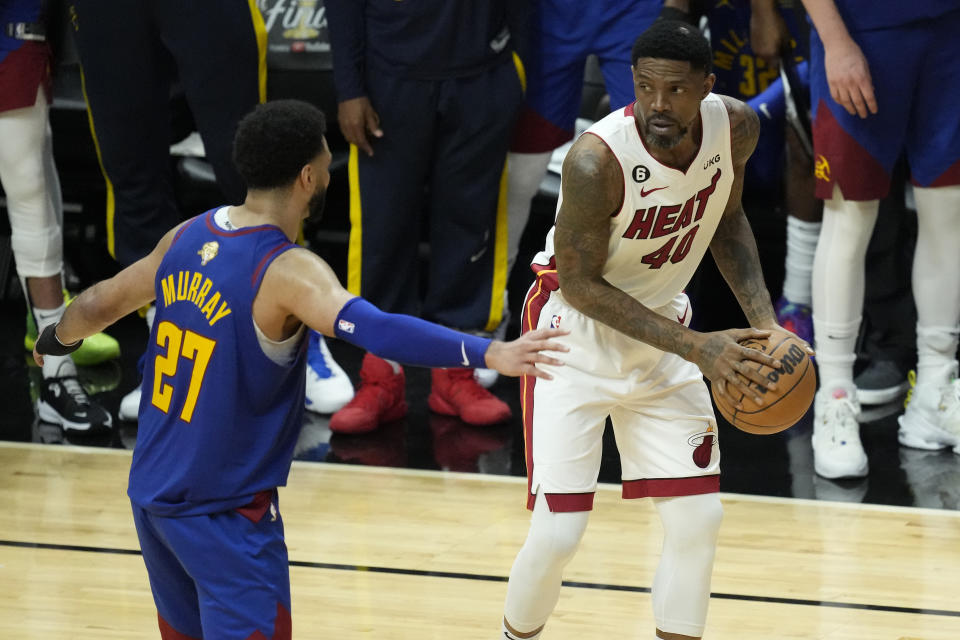 Denver Nuggets guard Jamal Murray (27) defends Miami Heat forward Udonis Haslem (40) during the second half of Game 3 of the NBA Finals basketball game, Wednesday, June 7, 2023, in Miami. (AP Photo/Rebecca Blackwell)