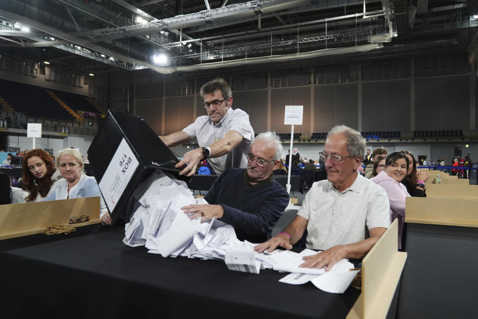Votes are counted at Emirates Arena in Glasgow, Scotland, during the count for Glasgow Central and Glasgow South constituencies in the 2024 General Election, Thursday, July 4, 2024. Britain’s Labour Party was headed for a huge majority in Britain’s election on Thursday, an exit poll suggested. (Andrew Milligan/PA via AP)