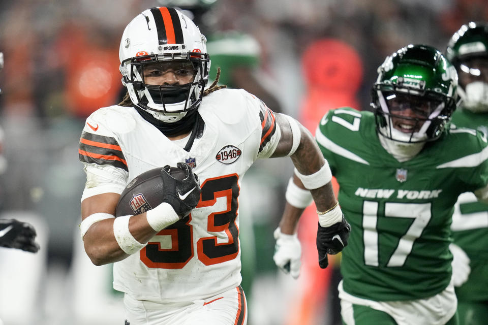 Cleveland Browns safety Ronnie Hickman intercept a pass for a touchdown intended for New York Jets wide receiver Garrett Wilson during the first half of an NFL football game Thursday, Dec. 28, 2023, in Cleveland. (AP Photo/Sue Ogrocki)