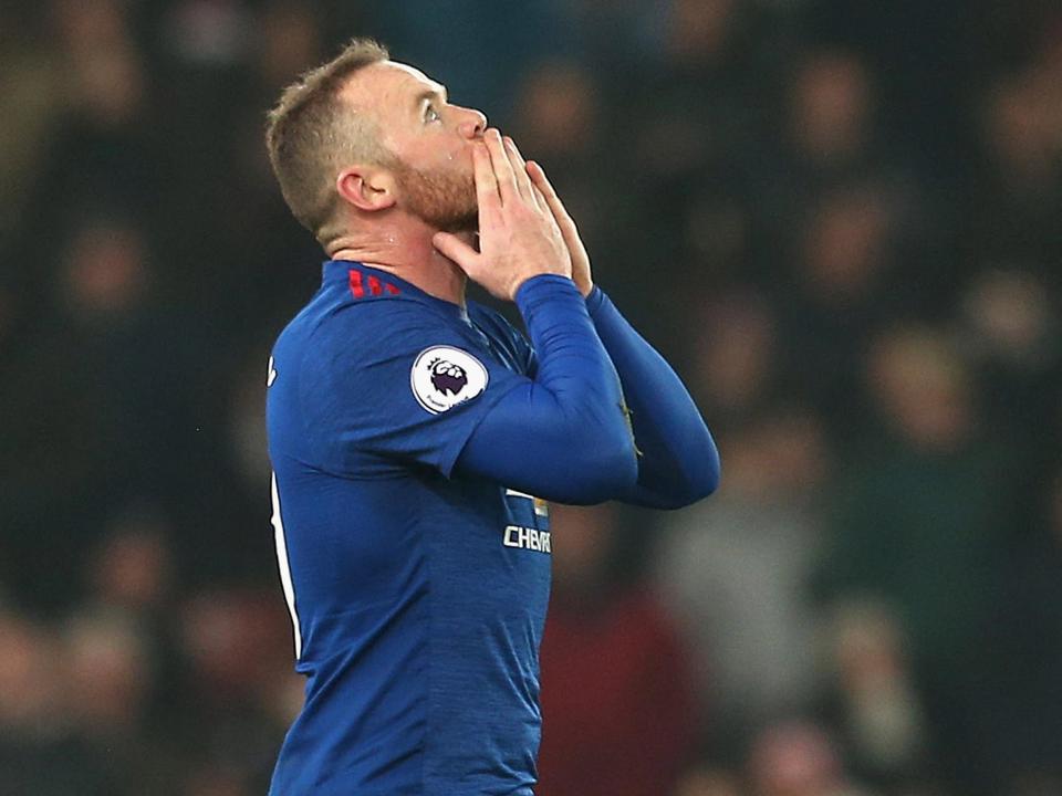 Rooney scored a stunning 93rd-minute free kick: Getty