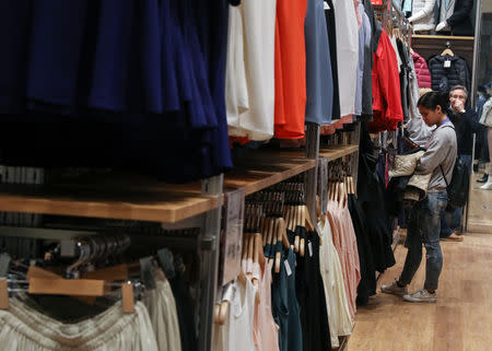 People shop at an H&M store during the grand opening of the The Hudson Yards development, a residential, commercial, and retail space on Manhattan's West side in New York City, New York, U.S., March 15, 2019. REUTERS/Brendan McDermid