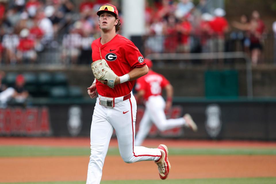 Georgia's Charlie Condon (24) takes the field at the start of a NCAA Athens Regional game against UNCW in Athens, Ga., on June 1.