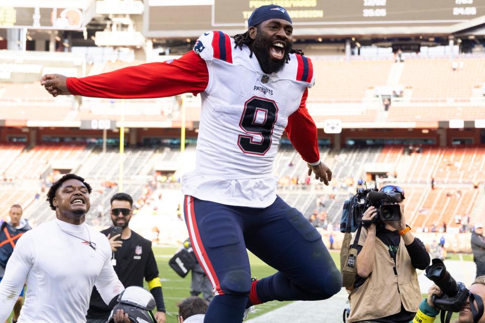 Oct 16, 2022; Cleveland, Ohio, USA; New England Patriots linebacker Matthew Judon (9) celebrates the team’s win as he goes to the locker room following the game against the Cleveland Browns at FirstEnergy Stadium. Mandatory Credit: Scott Galvin-USA TODAY Sports