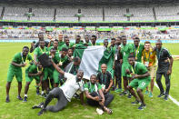 <p>The Nigerian soccer team arrived in Brazil hours before its match against Japan and still won 5-4. And here we are making excuses as to why we can't make it to the gym. (Photo by Pedro Vilela/Getty Images) </p>