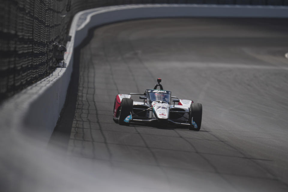 Takuma Sato, of Japan, drives into the Turn 2 during qualifying for the Indianapolis 500 auto race at Indianapolis Motor Speedway in Indianapolis, Sunday, May 19, 2024. (AP Photo/Michael Conroy)