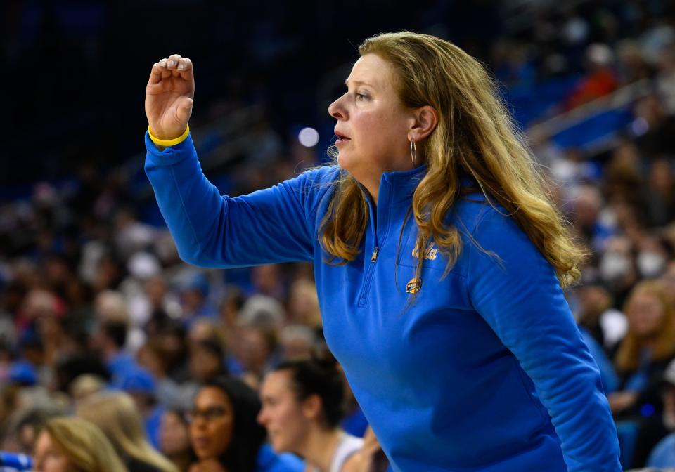 UCLA Bruins head coach Cori Close signals her team.