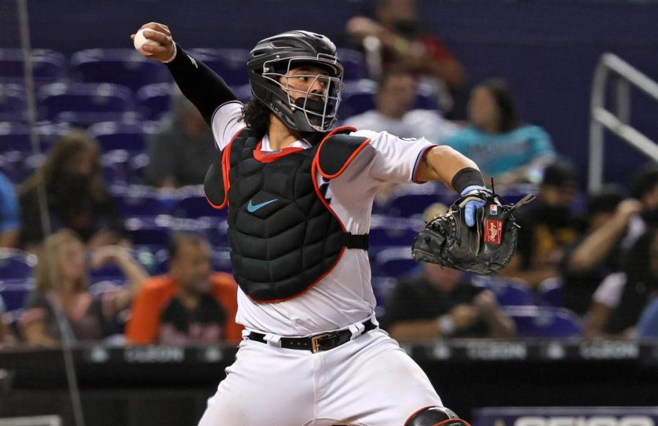 Miami Marlins catcher Jorge Alfaro (38) throws to second base while warming up before the start of ninth inning of their baseball game against the Washington Nationals at loanDepot park on Thursday, August 26, 2021 in Miami, Florida.