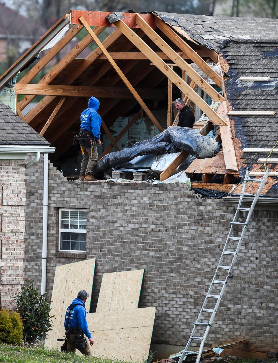 Repair work begins at several homes in the Utica area after the wind damage from Tuesday's tornado that hit parts of Southern Indiana and the Louisville metro area. Many homes were damaged. April 3, 2024