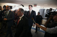 <p>Former FBI Director James Comey (wearing solid red tie) is escorted as he departs after testifying before a Senate Intelligence Committee hearing on Russia’s alleged interference in the 2016 U.S. presidential election on Capitol Hill in Washington, June 8, 2017. (Photo: Jonathan Ernst/Reuters) </p>