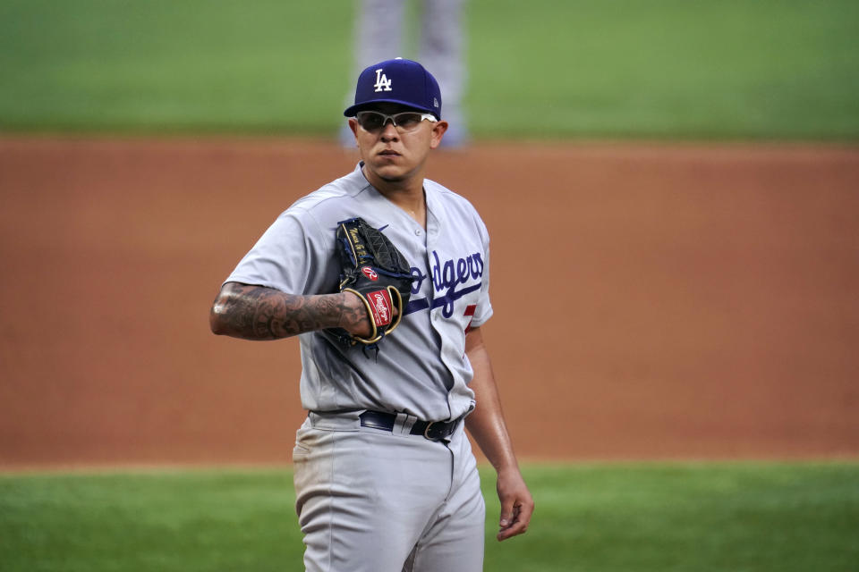 ARLINGTON, TX - OCTOBER 14:  Julio Urías #7 of the Los Angeles Dodgers looks on during Game 3 of the NLCS between the Atlanta Braves and the Los Angeles Dodgers at Globe Life Field on Wednesday, October 14, 2020 in Arlington, Texas. (Photo by Cooper Neill/MLB Photos via Getty Images)