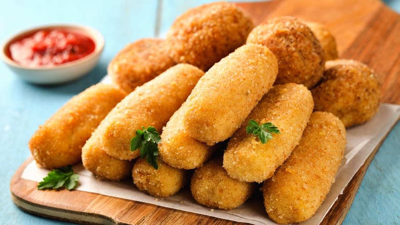 potato croquettes on cutting board