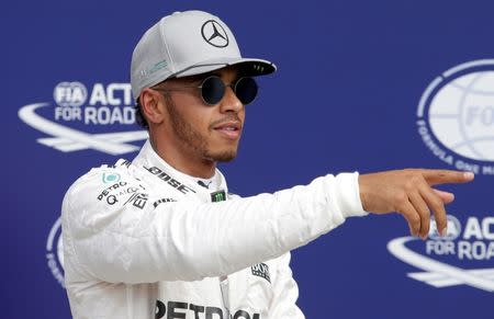 Formula One - F1 - Italian Grand Prix 2016 - Autodromo Nazionale Monza, Monza, Italy - 3/9/16 Mercedes' Lewis Hamilton celebrates qualifying in pole position Reuters / Max Rossi Livepic