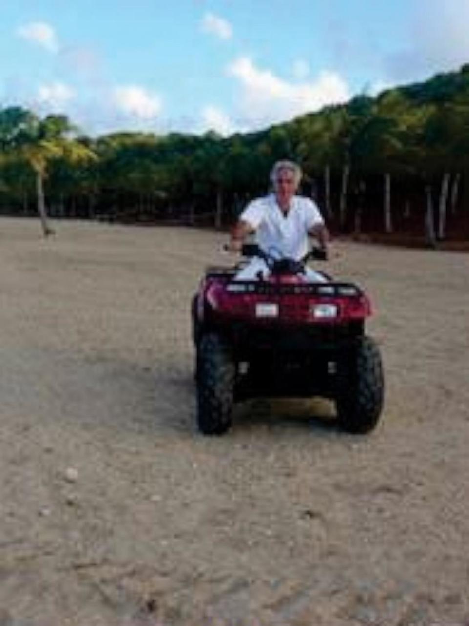 PHOTO: The late sex offender Jeffrey Epstein is seen on his private island in a 2006 photo that was included in a batch of newly unsealed court documents released Monday. (United States District Court Southern District of New York)