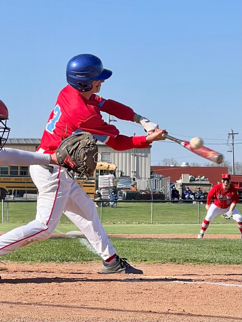 Ridgedale's A.J. Imbody swings at a pitch during a home baseball game against Elgin last year.