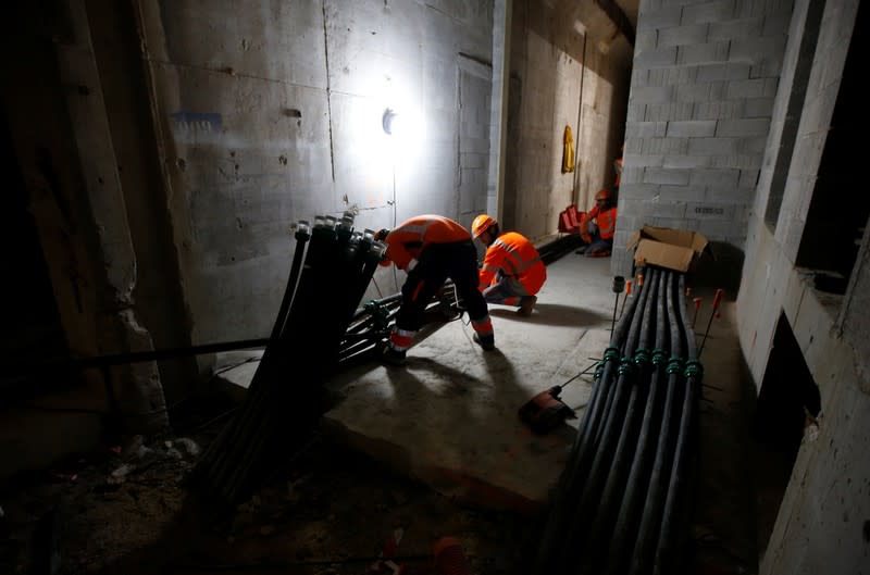 Technicians work at the construction site of Interxion MRS3 data center installed in an old German submarine base built during the Second World War in Marseille