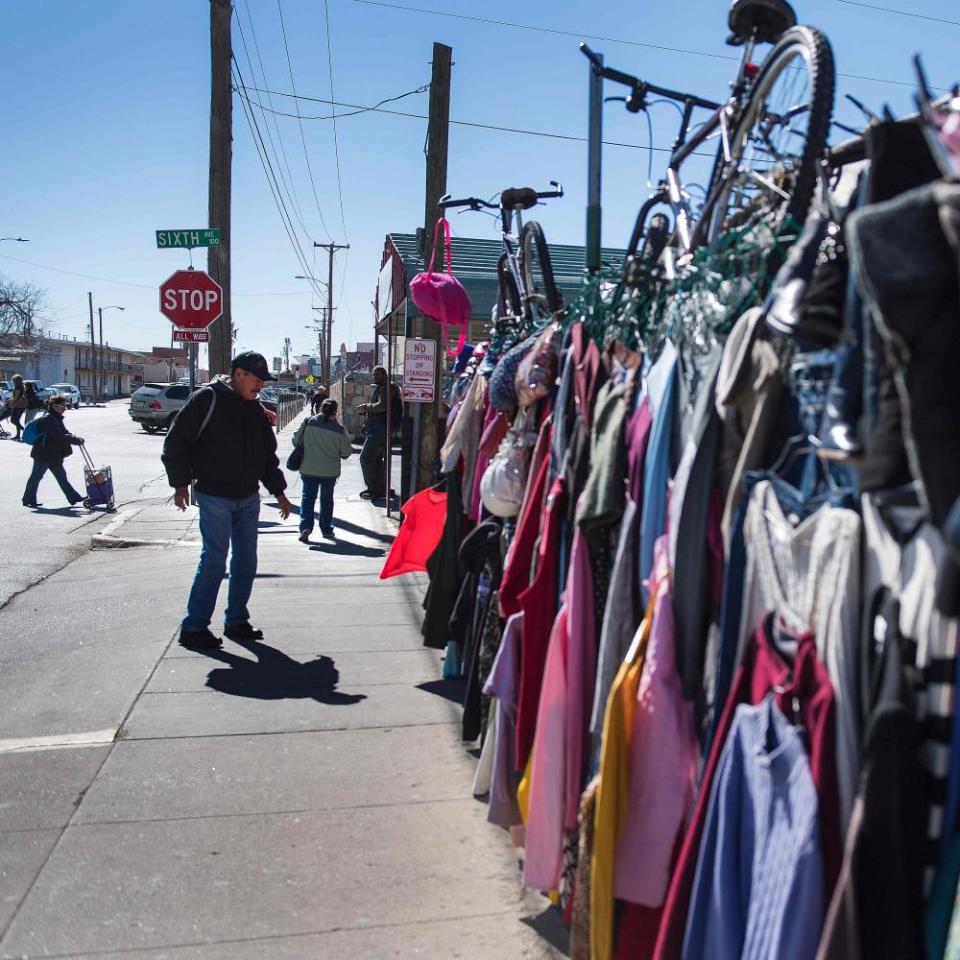 People shop at a roadside store near the port of entry in El Paso, Texas