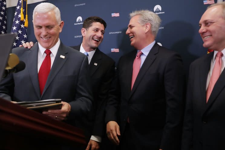 Vice President-elect Mike Pence shares a laugh with House GOP leaders Paul Ryan, Kevin McCarthy and Steve Scalise during a news conference at the U.S. Capitol on Wednesday. (Chip Somodevilla/Getty Images)