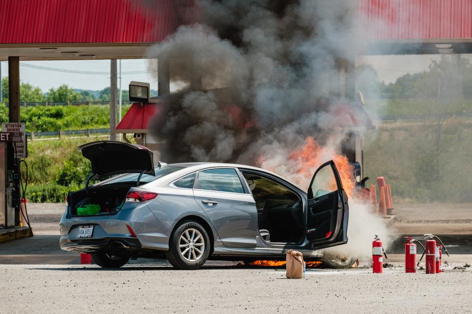 A 2019 Hyundai Elantra is seen engulfed in flames at the Eagle Truck Stop, Tuesday, July 11 in New Philadelphia.