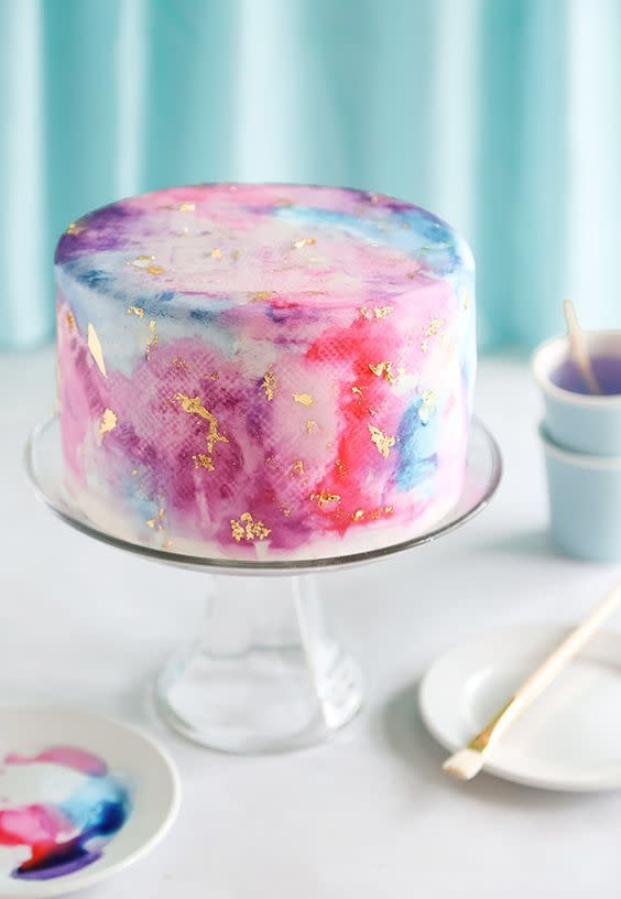 <p>This cake looks WAY too good to eat. It’s been hand painted with watercolour paints AND has gold flecks. <i><a href="https://uk.pinterest.com/pin/19914423330393861/" rel="nofollow noopener" target="_blank" data-ylk="slk:[Photo: Pinterest];elm:context_link;itc:0;sec:content-canvas" class="link "> [Photo: Pinterest]</a></i></p>