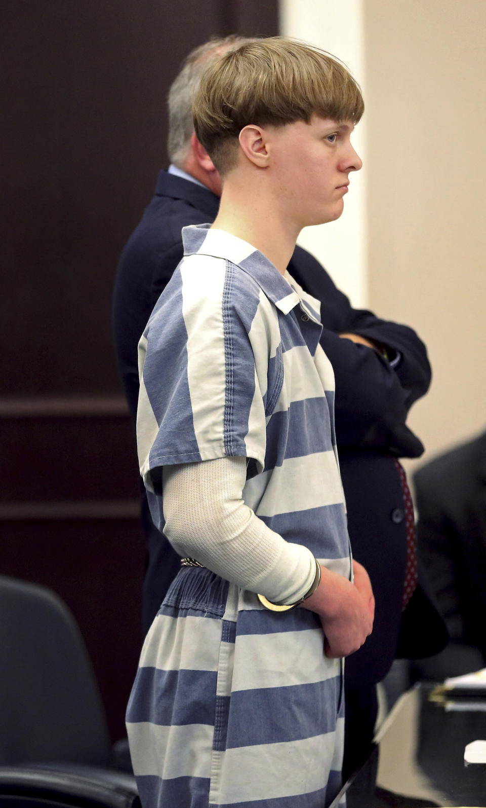 Dylann Roof appears in the Charleston County Court Monday April 10, 2017 to enter his guilty plea on murder charges in Charleston,S.C. The convicted Charleston church shooter, Roof was given nine consecutive life sentences in state prison after he pleaded guilty to state murder charges Monday, leaving him to await execution in a federal prison and sparing his victims and their families the burden of a second trial. (Grace Beahm/The Post And Courier via AP, Pool)