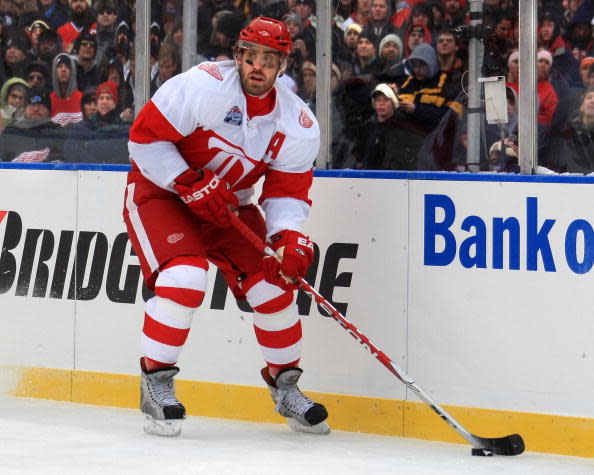 CHICAGO - JANUARY 01: Henrik Zetterberg #40 of the Detroit Red Wings skates with the puck during a NHL game against the Chicago Blackhawks on January 1, 2009 at Wrigley Field in Chicago, Illinois. The Wings won 6-4 (Photo by Dave Reginek/NHLI via Getty Images)